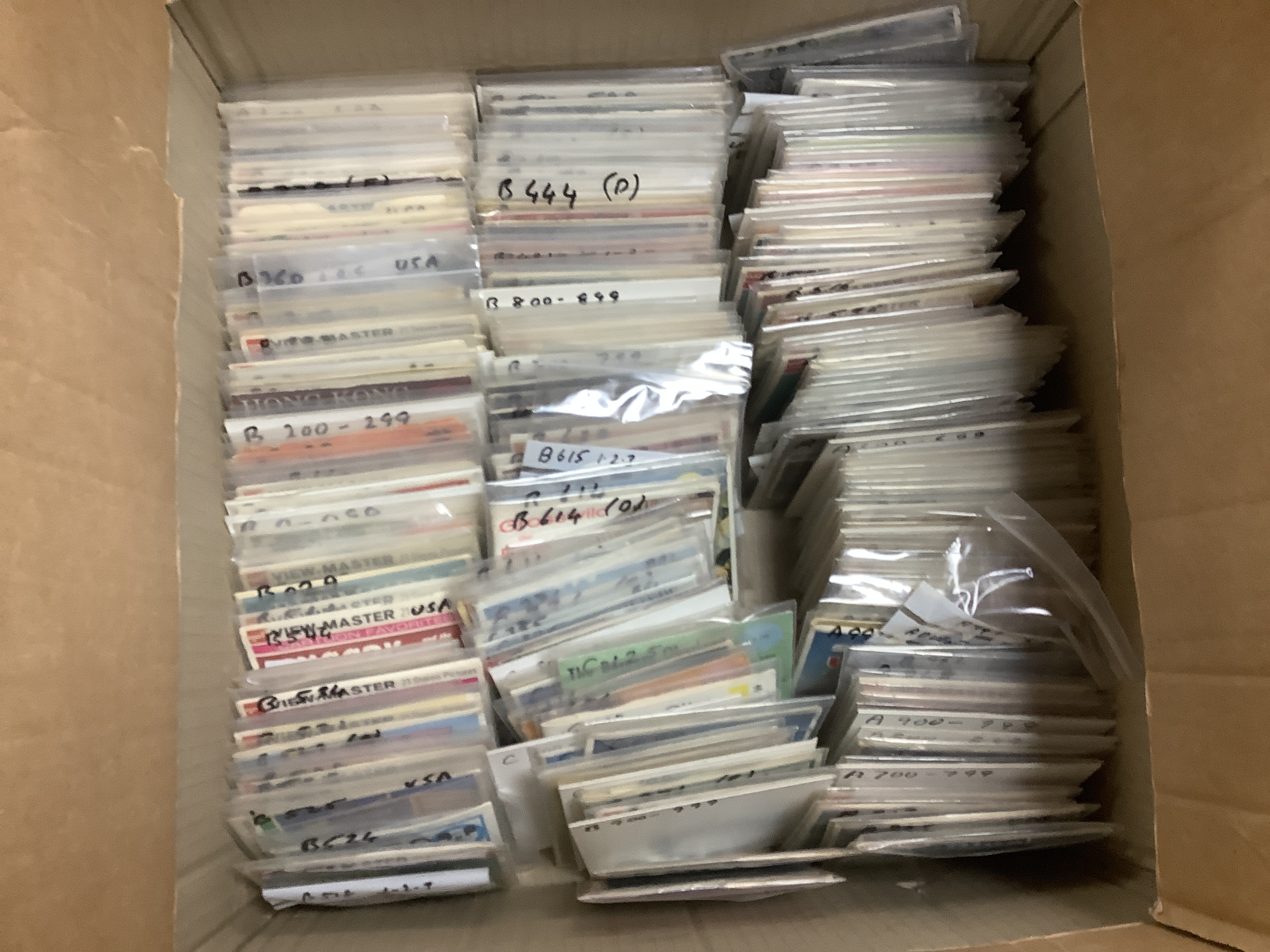 A collection of 21 View-Master viewers, including various models, a View-Master Projector and a large quantity of View-Master reels etc